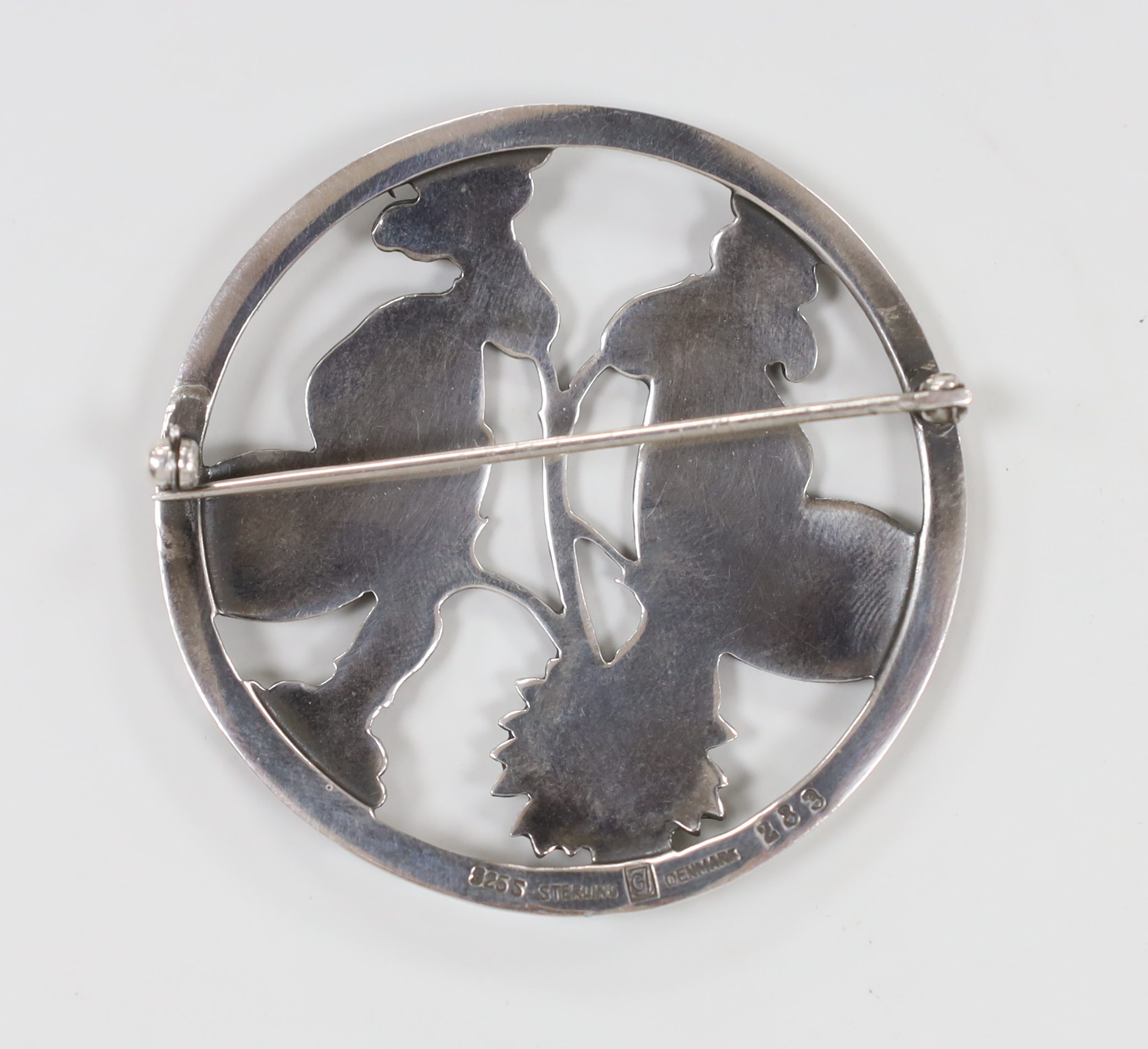 A Georg Jensen sterling 'moonlight Blossom' circular brooch, designed by Arno Malinowski, design no. 283, 52mm.